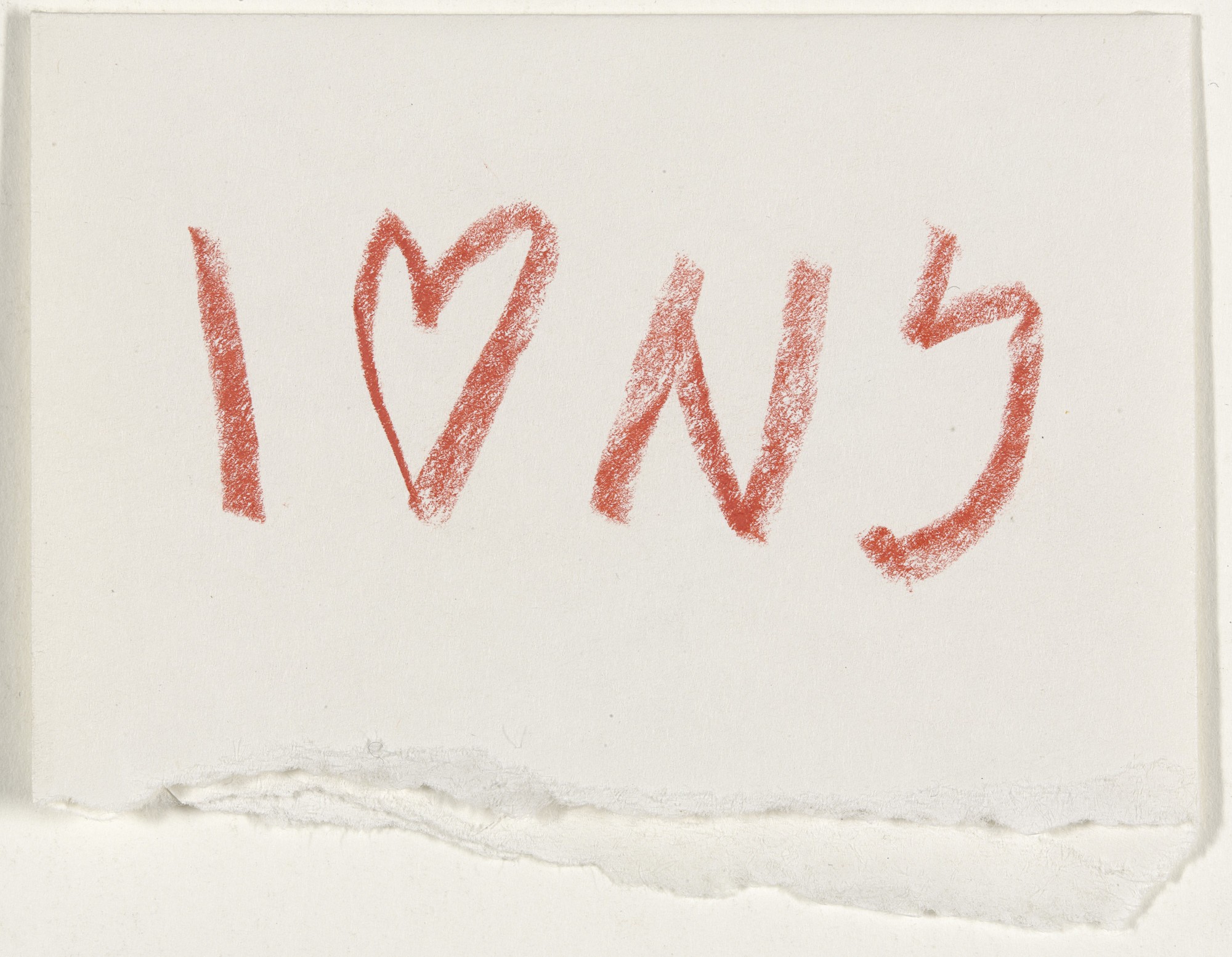 I ♥ NY sketched in thick red strokes on a scrap of white envelope with a torn bottom edge
